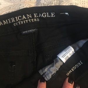 AE black jeggings. Ripped knees. Size 8